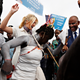 White House senior adviser Ivanka Trump dances with traditional dancers as she is welcomed by local people on arrival to Adzope, Ivory Coast, Wednesday April 17, 2019, where she will tour Cayat, a cocoa and coffee cooperative.